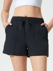Black utility shorts with drawstring waist and pockets