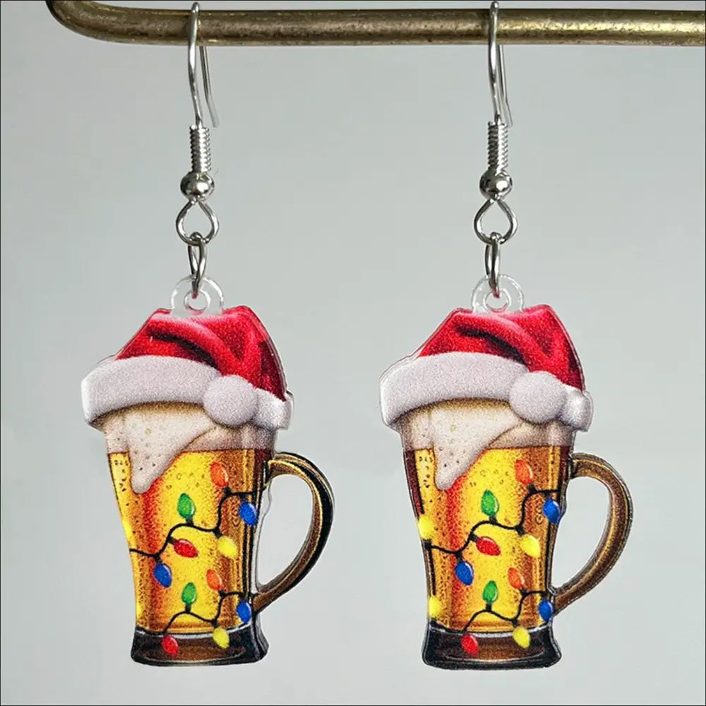 Festive acrylic novelty drop earrings shaped like beer mugs with Santa hats and colorful lights.