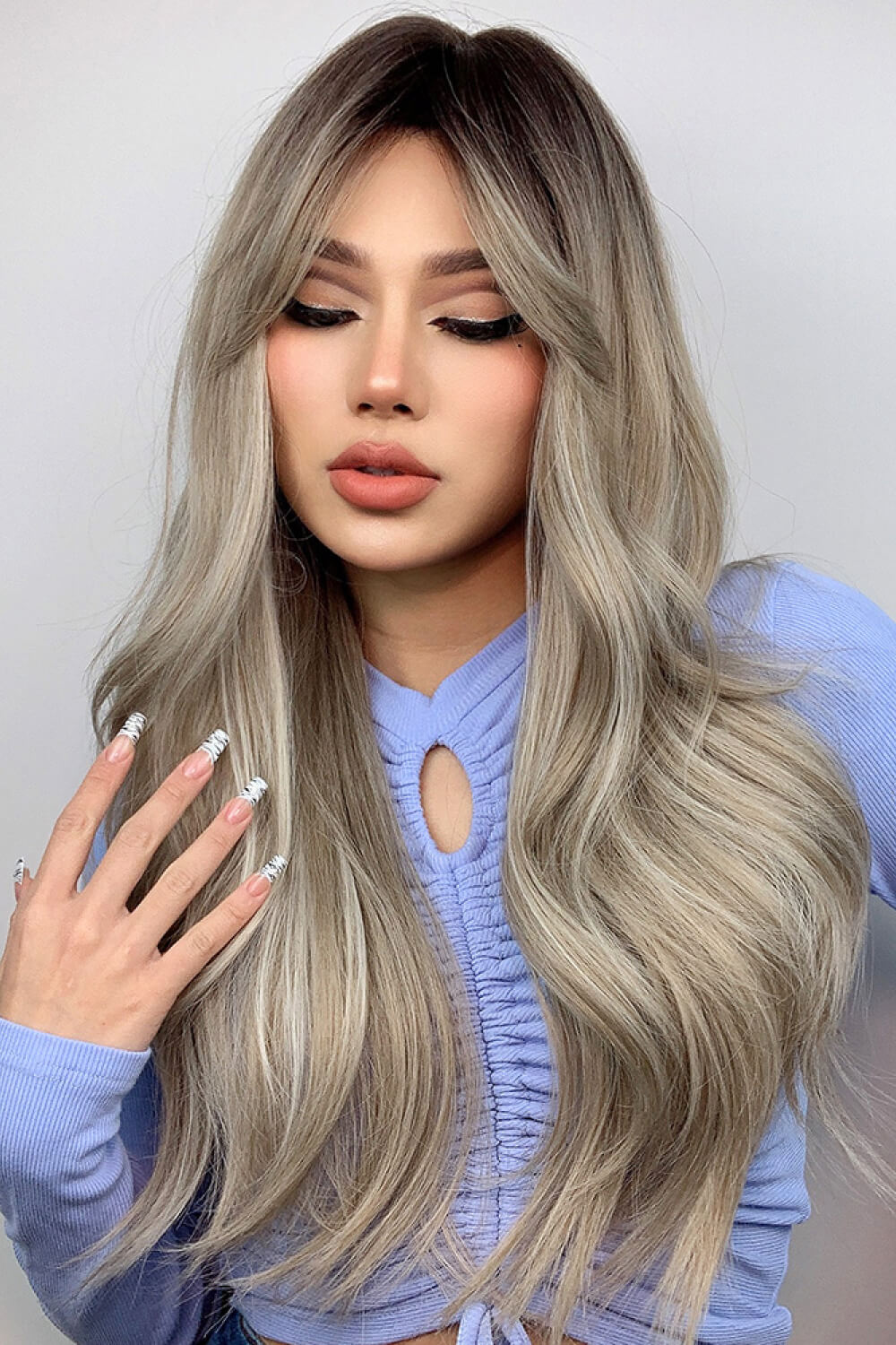 Ombre Wave Frontal Wig in Ash Blonde Balayage with face-framing layers and loose waves.