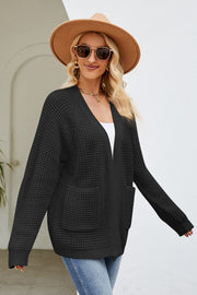 Black waffle knit cardigan with patch pockets and a V-neck.
