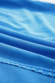 Blue mineral wash cotton tee with visible stitching detail