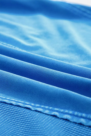 Blue mineral wash cotton tee with visible stitching detail