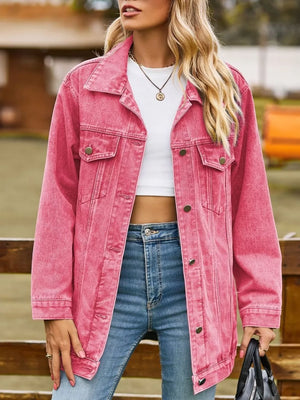 Relaxed fit hot pink washed denim trucker jacket with button-down front and chest pockets.