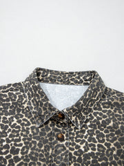 Denim leopard print shirt with button front and collar.