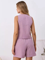 Purple cotton tie-front top and shorts set with textured fabric.