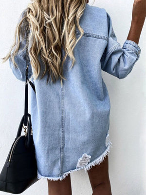 Light denim shirtdress with distressed details and raw hem, shown from the back.