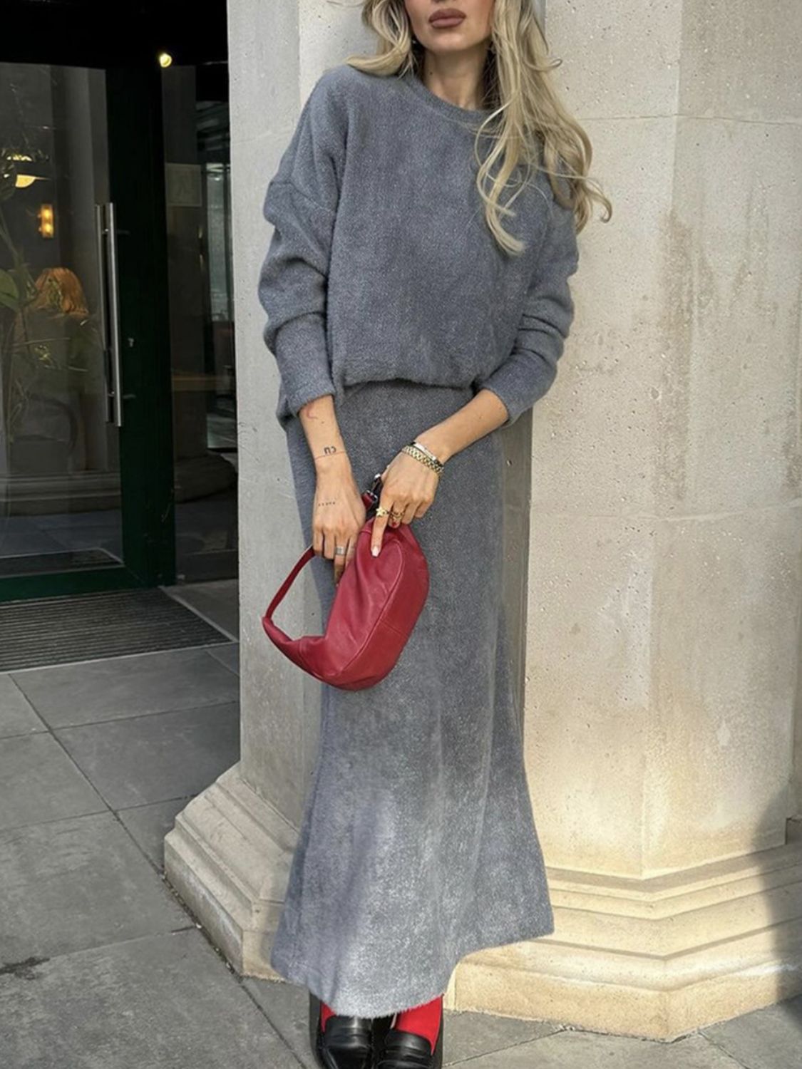 Gray textured knit co-ord set with relaxed fit sweater and maxi skirt.