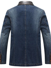 Men's denim blazer in Denim Blue with a faux leather collar and button cuffs.
