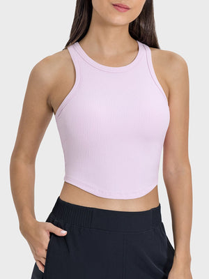 Blush pink ribbed racerback active tank top with round neckline.