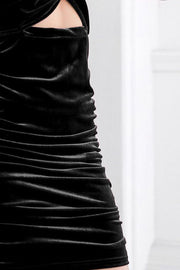 Black velvet ruched mini dress with cut-out detail