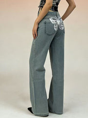 Light blue cotton blend maternity jeans with butterfly back detail and wide leg
