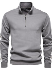 Gray quarter-zip sweatshirt with white side panel detail and a stand-up collar.