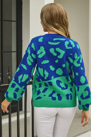Colorblock leopard knit sweater with balloon sleeves in blue and green acrylic.