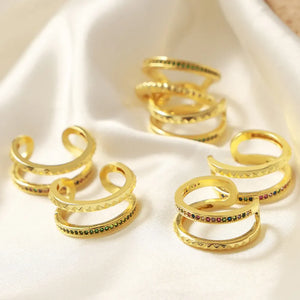 Double band rings with pavé multicolor and dark green stones, gold tone copper metal