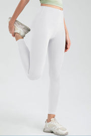 White high rise leggings with a seamless design and athletic fit