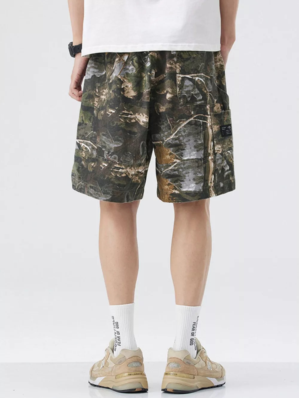 Men's camouflage trunks in Black Forest pattern with cargo pockets and a relaxed fit.