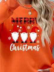 Orange Christmas sweatshirt with three gnomes and Merry Christmas graphic.