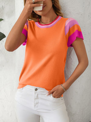 Colorblock knit top with flutter sleeves in orange, pink, and purple stripes.