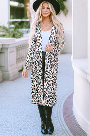 Leopard print duster cardigan with long sleeves and open front, styled with a white tank and black pants.