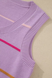 Lavender knit sweater vest with pink and brown diagonal stripes.
