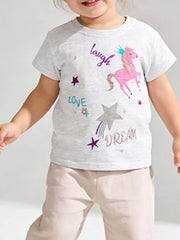 Toddler t-shirt, white cotton, relaxed fit, with whimsical unicorn graphic.