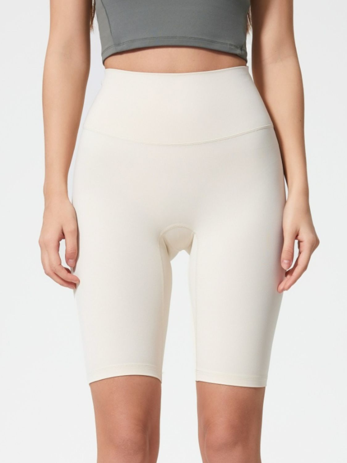 Sculpted Contour Active Cycling Shorts in White with high waist and seamless design.