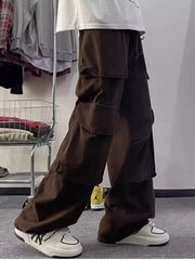 Brown cargo pants with multiple large pockets and a relaxed fit.
