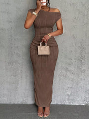 Textured one-shoulder maxi dress in khaki with ruched detail and asymmetrical neckline.