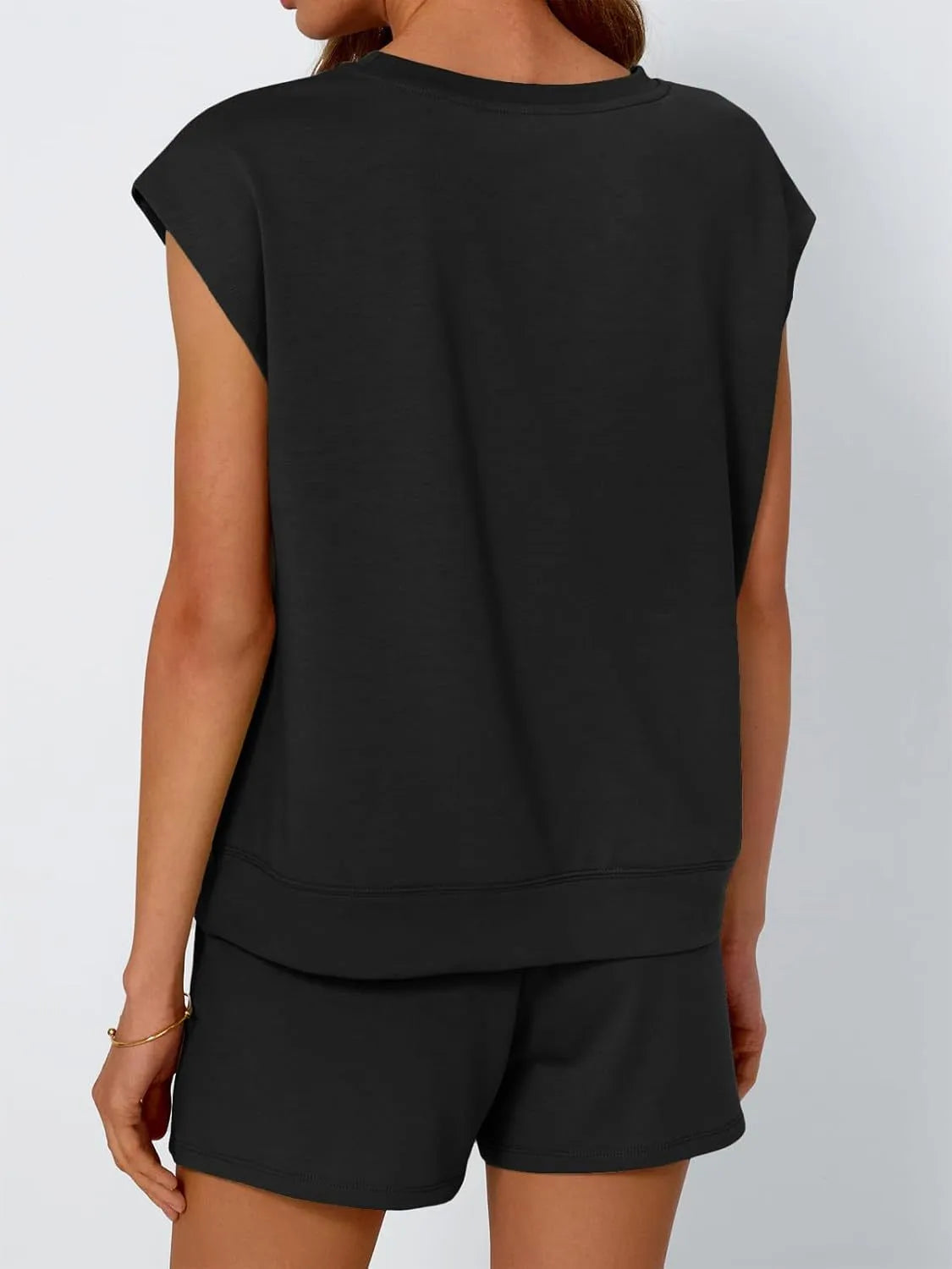 Black relaxed cap-sleeve loungewear set with drawstring shorts.