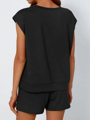 Black relaxed cap-sleeve loungewear set with drawstring shorts.