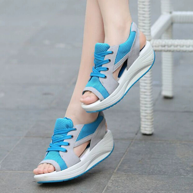 Blue and gray sporty lace-up wedge sandals with breathable mesh and adjustable straps.