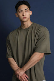 Oversized crew neck t-shirt in olive brown with a modern silhouette.
