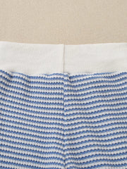 Baby knit set with blue and white stripes and a white ribbed waistband.