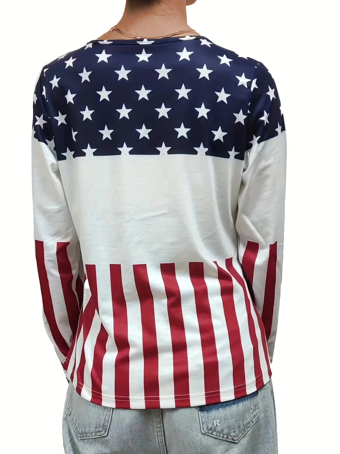 Long sleeve top with American flag print, featuring stars and stripes.