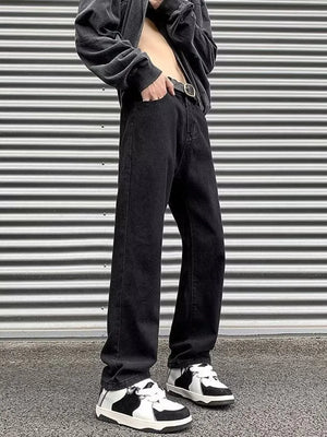 Men's black wide-leg jeans with a washed finish and casual styling.