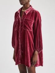 Velvet oversized shirt in deep purple with button front, two chest pockets, and balloon sleeves.