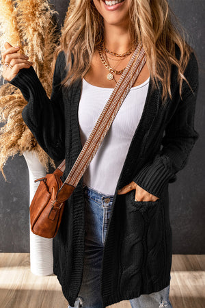 Black cable knit open-front cardigan with pockets, acrylic material.