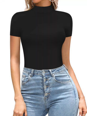 Black mock neck short sleeve form-fitting bodysuit styled with high-waisted jeans