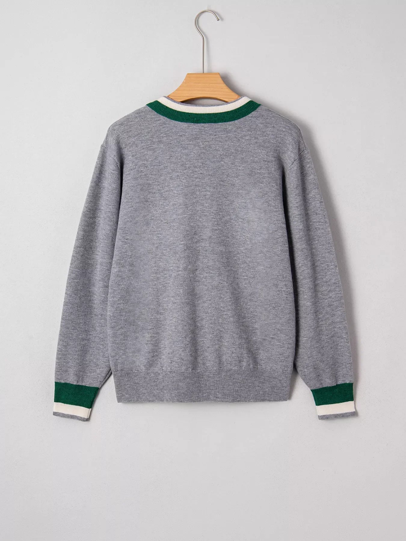 Gray V-neck sweater with green and white striped trim at neckline and cuffs.