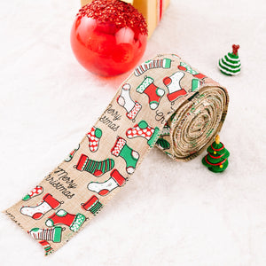 Burlap ribbon with Christmas stocking pattern and Merry Christmas text, beige with red and green accents.