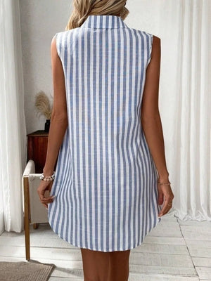 Sleeveless collared shirt dress in light blue and white vertical stripes, above the knee length.