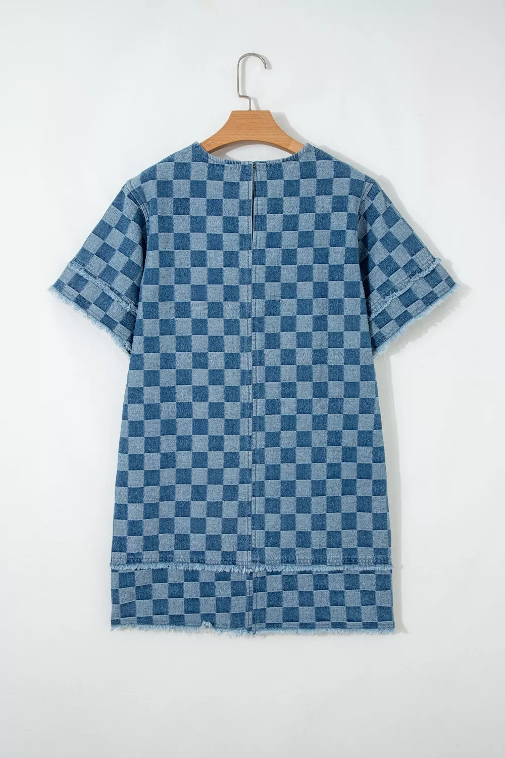 Checkered denim mini dress with frayed hems and short sleeves.