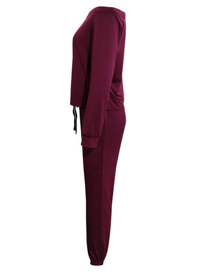Burgundy off-shoulder lounge set with ruched hem detail and drawstring.