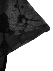 Black mesh t-shirt with velvet floral burnout detail and mandarin collar.