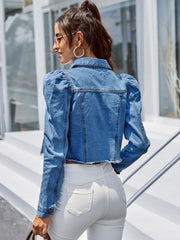 Light wash denim jacket with puffed sleeves and raw hem, cropped length
