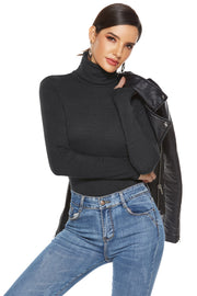 Black ribbed turtleneck bodysuit with long sleeves, styled with jeans and a leather jacket.