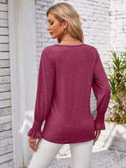 Maroon lace trim v-neck blouse with blouson sleeves and ruffled cuffs.