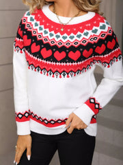 White acrylic sweater with red heart motif, crew neck, and fair isle pattern.