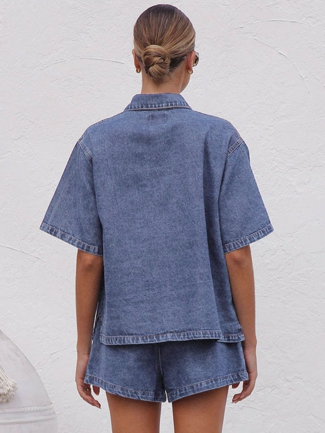 Relaxed denim shirt and drawstring shorts set in medium wash.