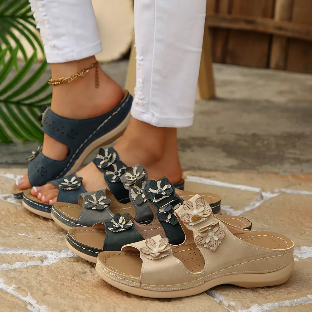 Floral appliqué mid-heel sandals in beige, navy, gray, and army green with comfortable cushioned soles.